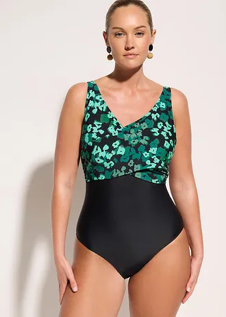 Stahovací jednodílné plavky se zavinovacím vzhledem, střední tvarující efekt, barva: černo-zelená s květy