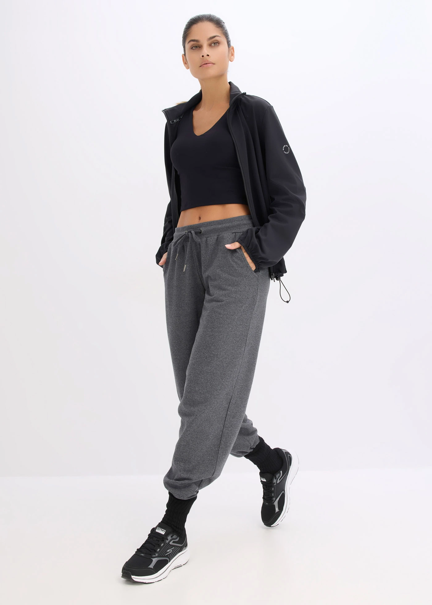 Sutien sport top cu susținere medie, din material cu textură de bumbac • negru • magazin bonprix