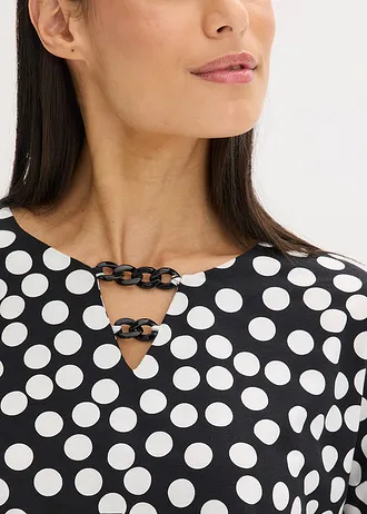 Tunică cu mânecă lungă, cu accesoriu decorativ • negru/ecru punctat • magazin bonprix