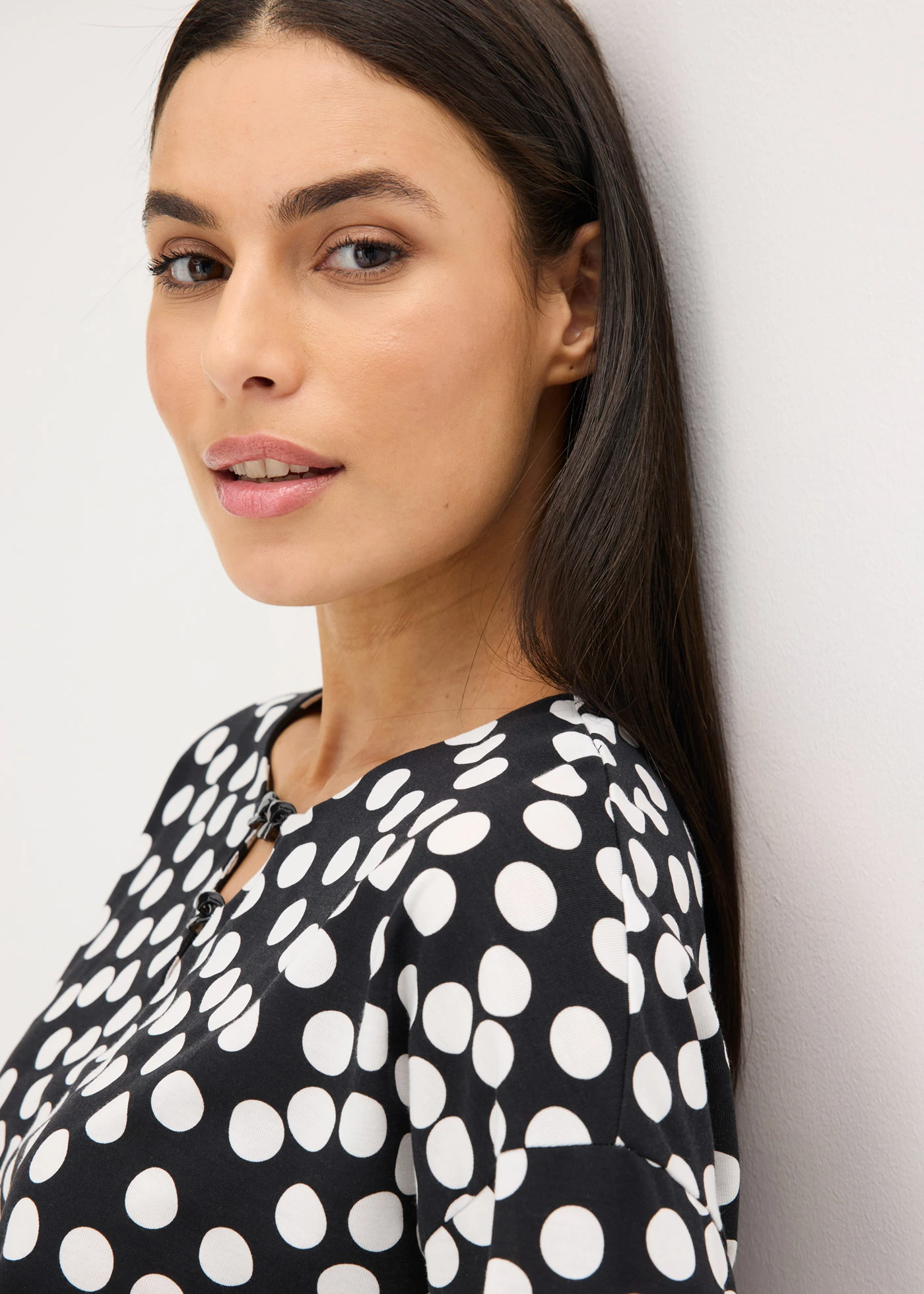 Tuniek met lange mouwen en sierdetails • gestipt zwart-wolwit • bonprix online shop