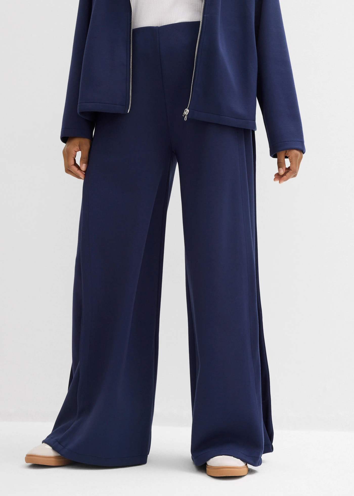 Pantaloni largi din material cu modal, cu falduri laterale • bleumarin • magazin bonprix