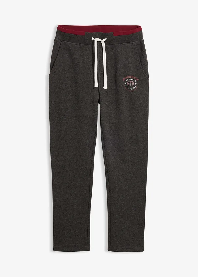 Spodnie sportowe ze sportowymi detalami - Bonprix