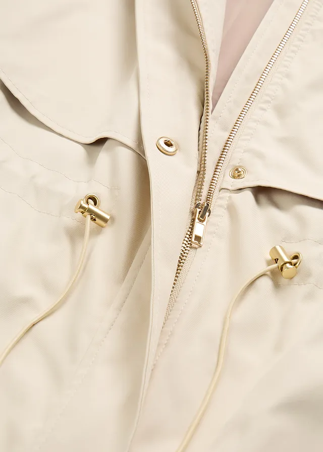 Lange tussenjas met afneembare capuchon • lichtsand • product-page.page-title-suffix