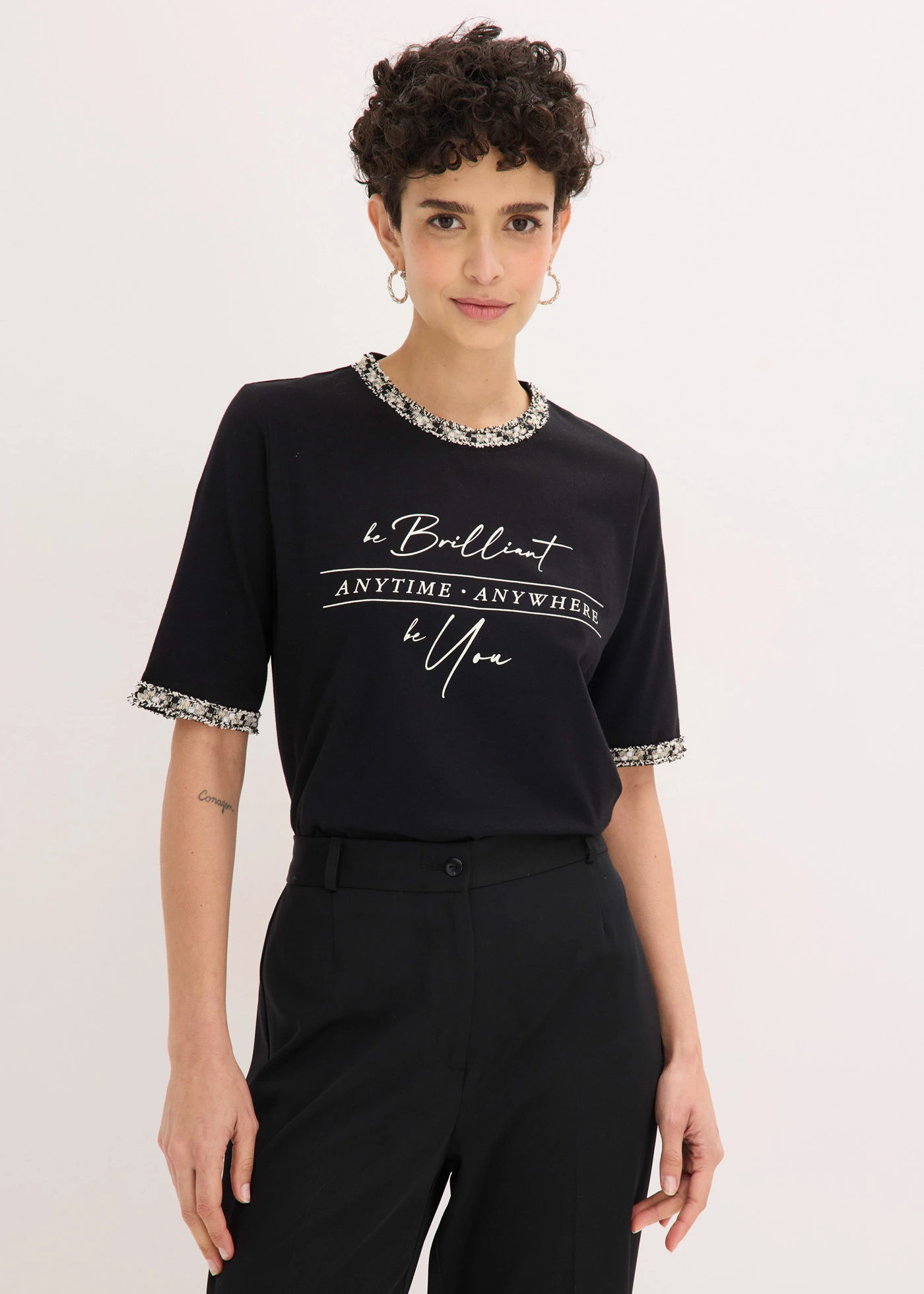 Shirt van biologisch katoen met applicatiezoom • zwart gedessineerd • bonprix online shop