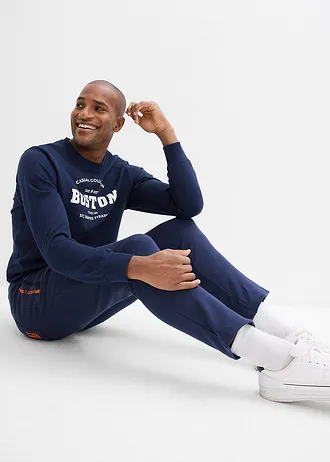 Joggingové kalhoty s praktickými kapsami na zip, z organické bavlny • tmavě modrá • bonprix obchod