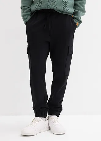 Spodnie sportowe z kieszeniami cargo, loose fit • czarny • sklep bonprix