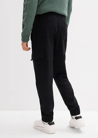 Spodnie sportowe z kieszeniami cargo, loose fit • czarny • sklep bonprix
