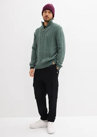 Spodnie sportowe z kieszeniami cargo, loose fit • czarny • sklep bonprix