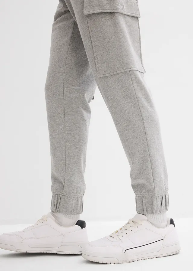 Spodnie sportowe z kieszeniami cargo, loose fit • jasnoszary melanż • sklep bonprix