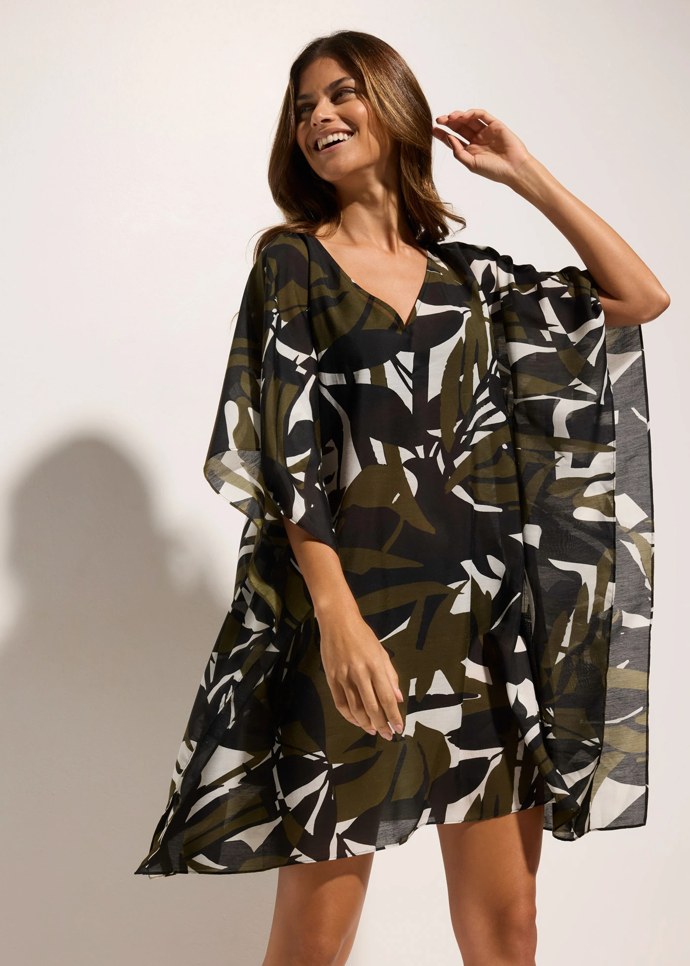 Transparante strandtuniek • zwart-donkerkaki met grafische print • bonprix online shop