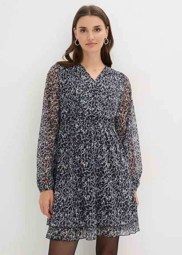 Jersey jurk van fijn mesh • zwart met luitpaardprint • product-page.page-title-suffix