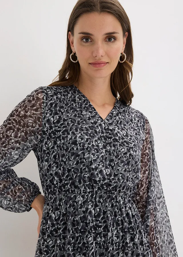 Jersey jurk van fijn mesh • zwart met luitpaardprint • product-page.page-title-suffix
