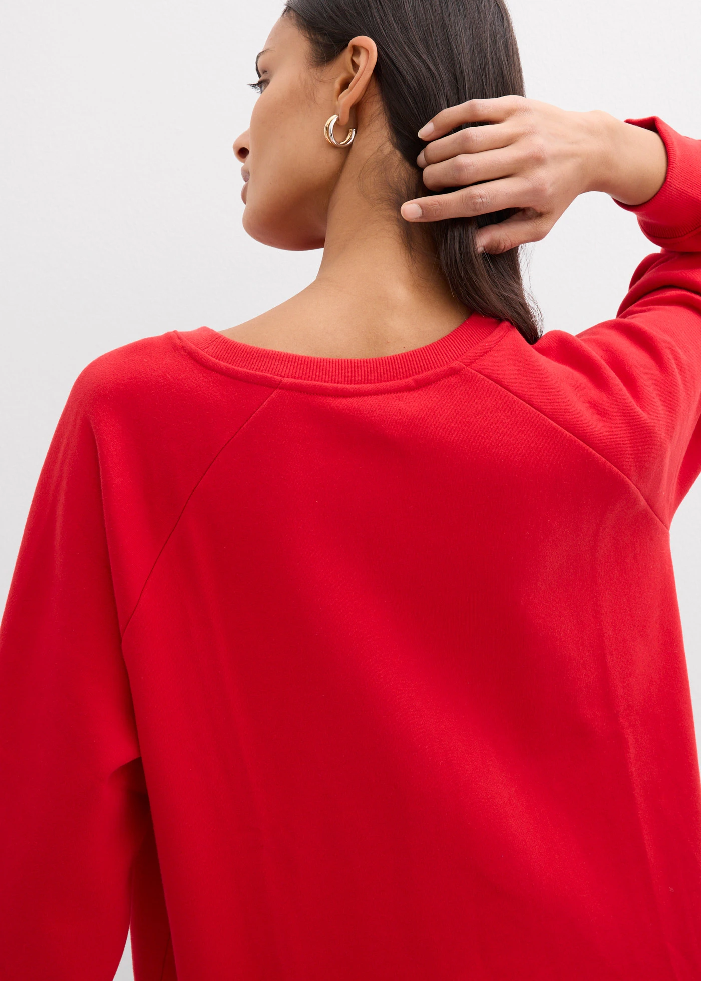 Oversized sweater van biologisch katoen • aardbeirood-wit met print • bonprix online shop