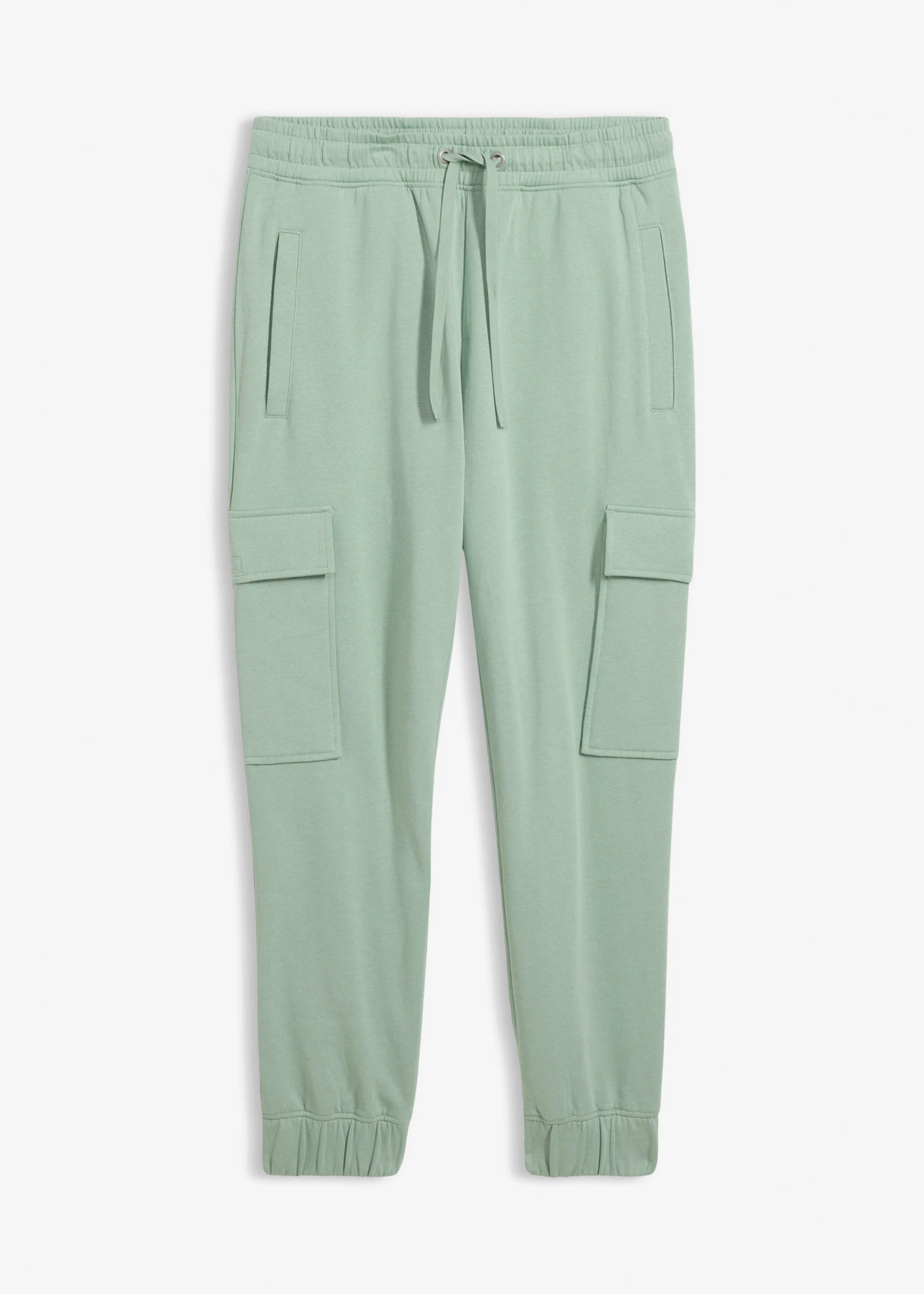 Spodnie sportowe z kieszeniami cargo, loose fit • zielony pastelowy • sklep bonprix