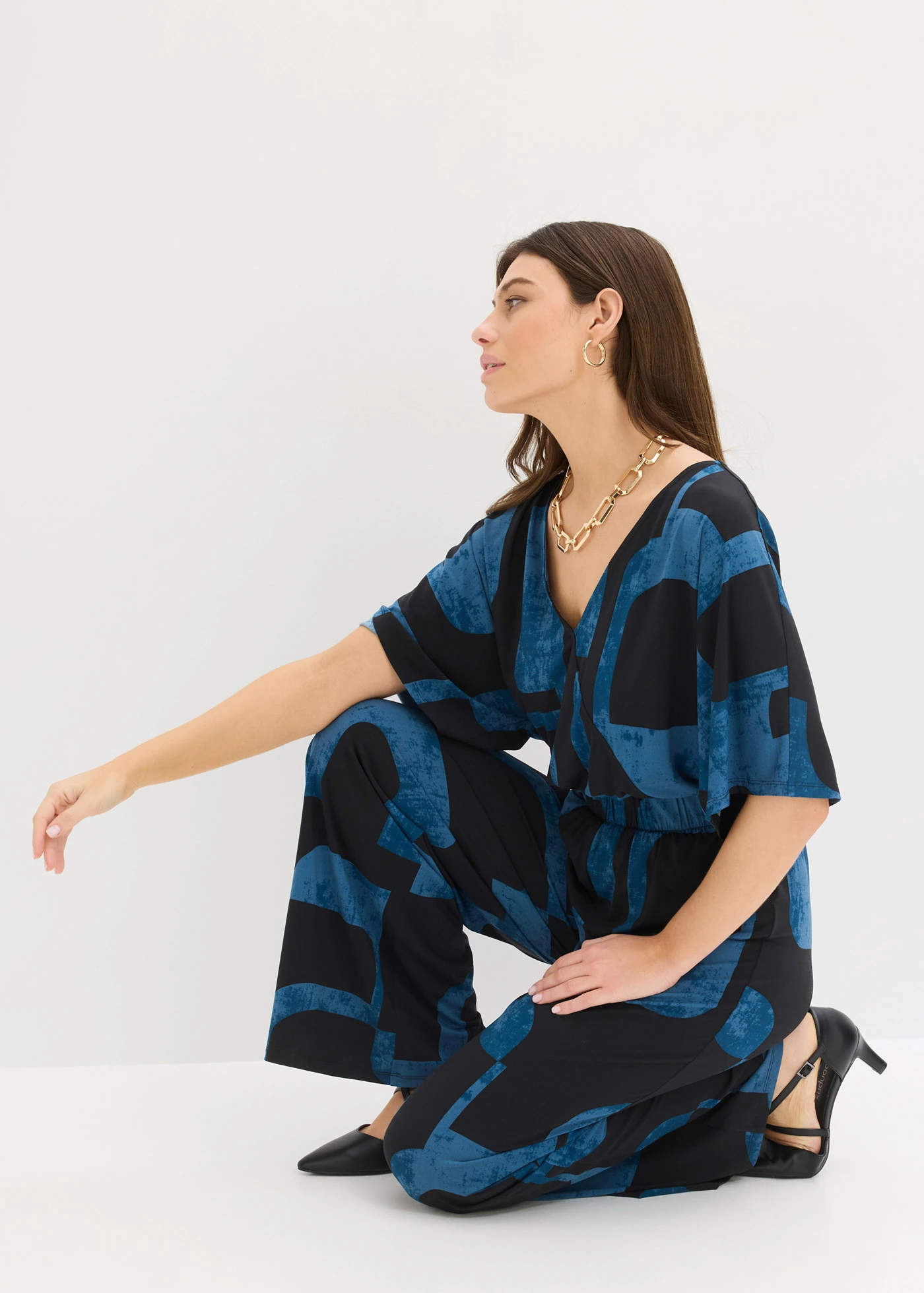 Jersey jumpsuit • zwart/blauwpetrol gedessineerd • bonprix online shop