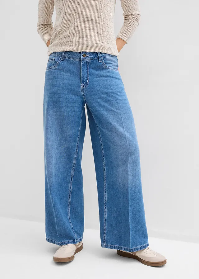 Dżinsy z szerokimi nogawkami, mid waist • jasnoniebieski denim "used" • sklep bonprix