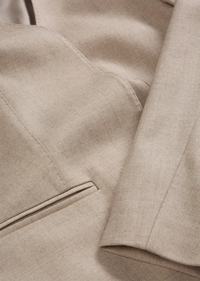 Kraagloze blazer in een zachte wolmix • lichtsand gemêleerd • product-page.page-title-suffix