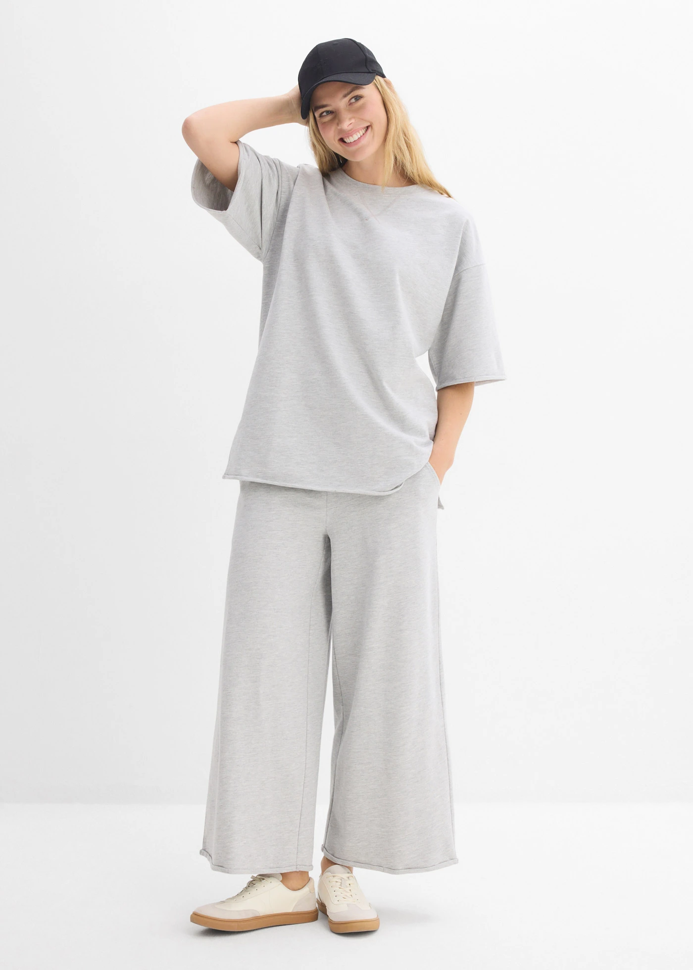 Pantalon 7/8 en sweat • gris clair chiné • Boutique bonprix