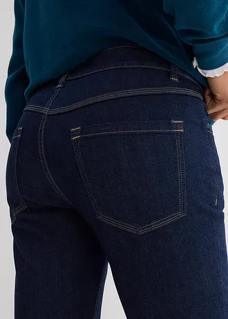 Jeansy o kroju slim fit, średni stan, z bawełny organicznej • granatowy denim used • sklep bonprix