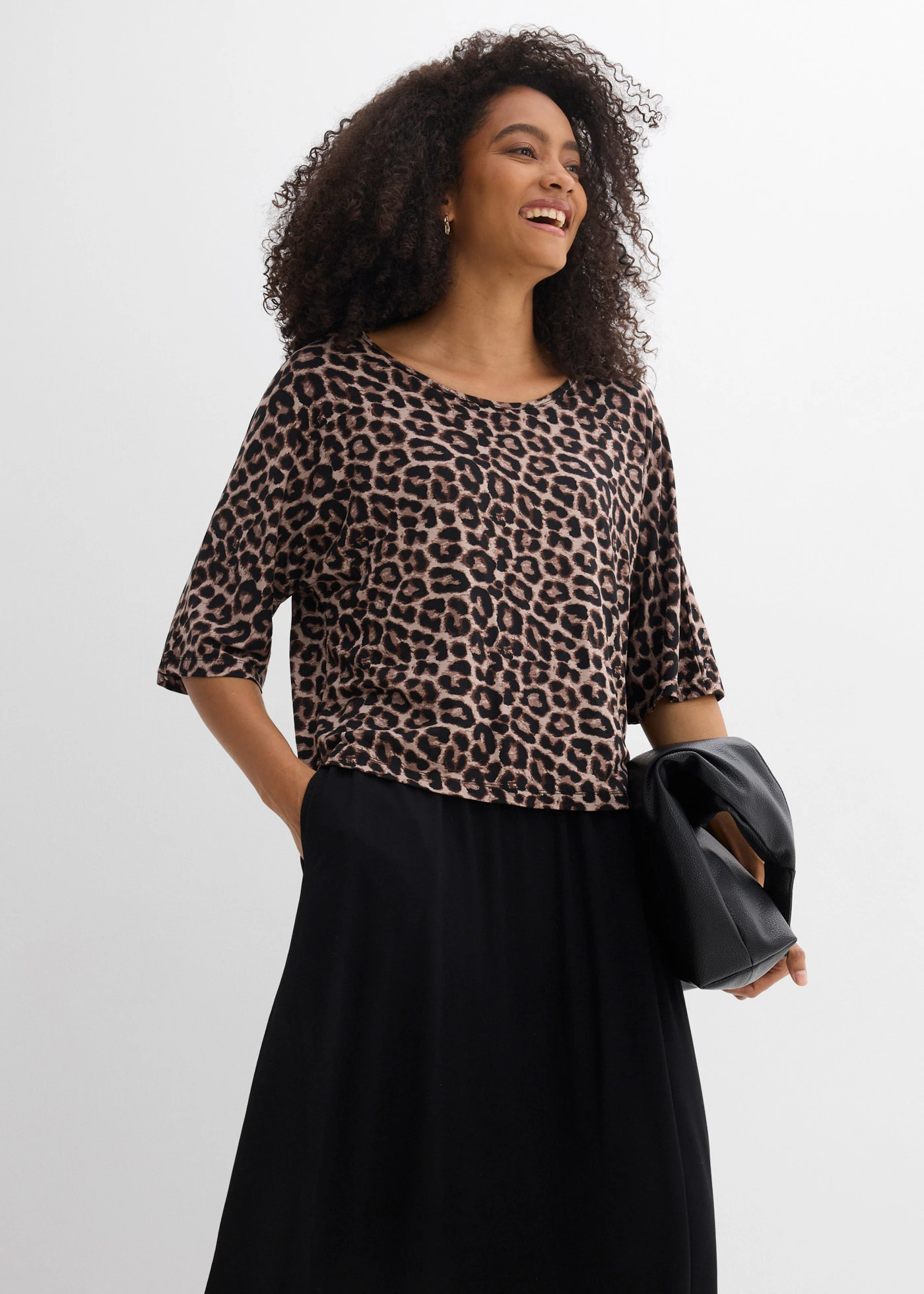 Rochie din tricot din bumbac 100% • negru-imprimeu leo • magazin bonprix