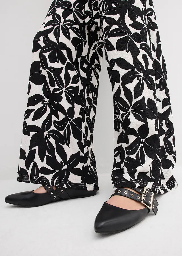 Jersey jumpsuit • crème-zwart • product-page.page-title-suffix