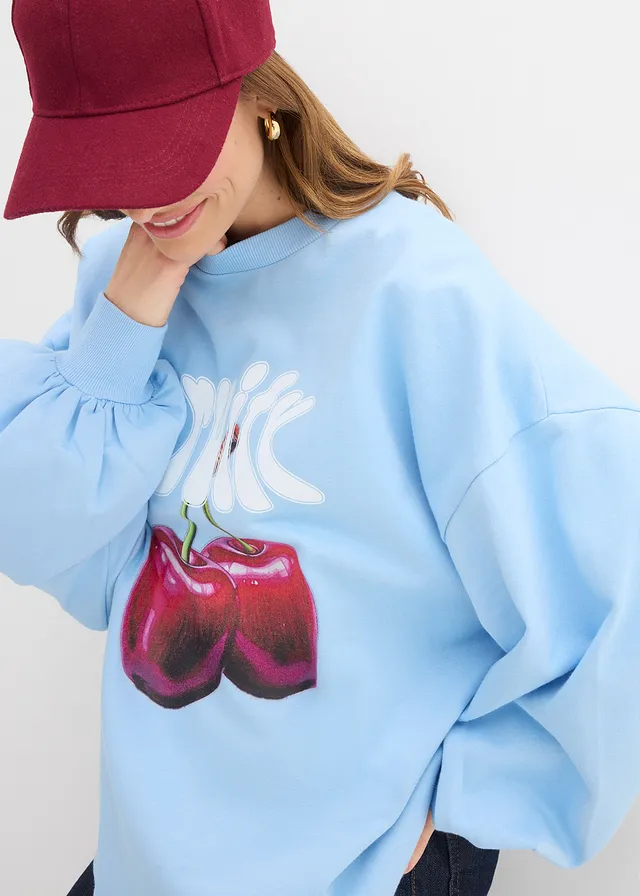 Oversized sweater van biologisch katoen • lichtblauw-wit met print • product-page.page-title-suffix