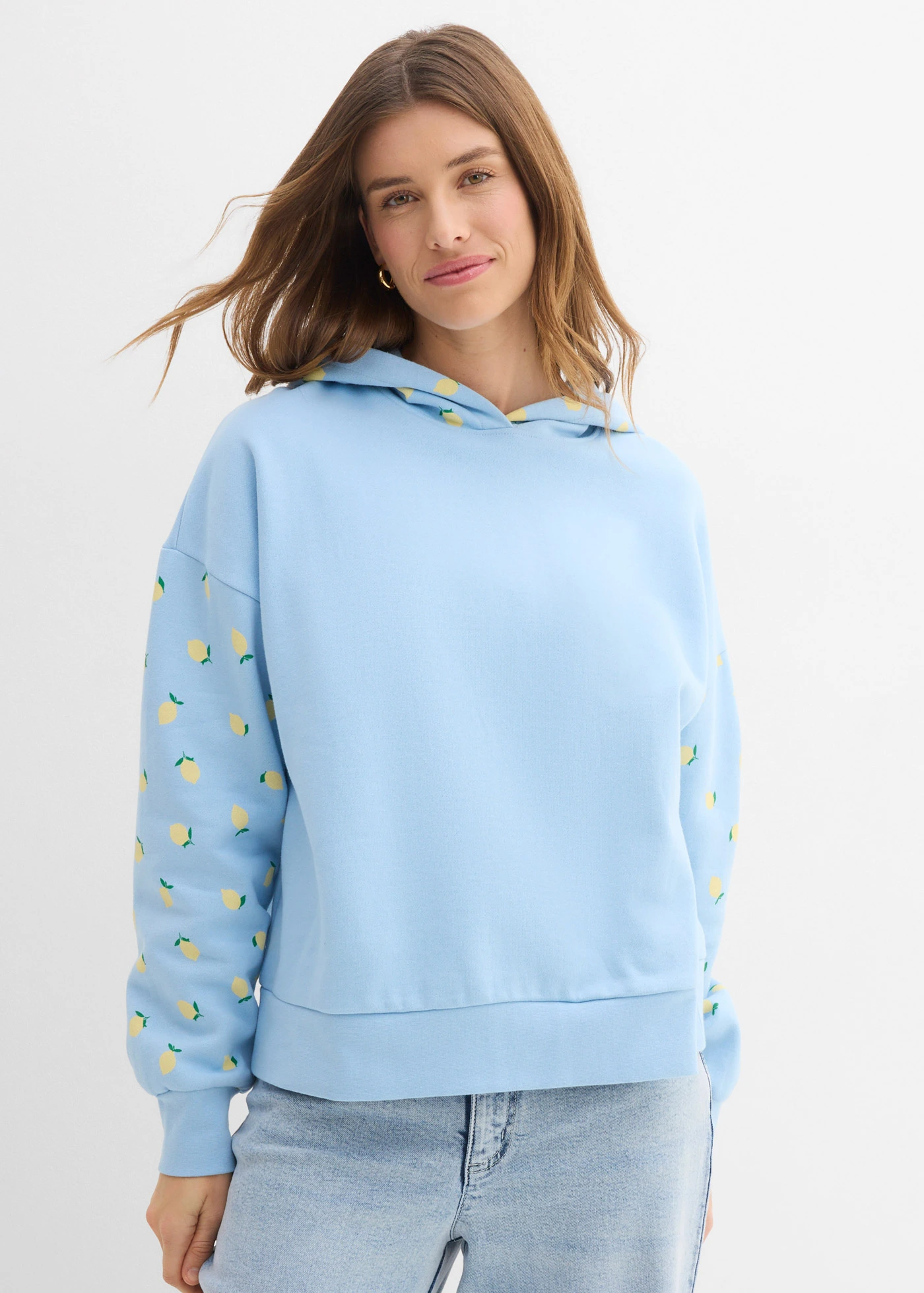Sweat large à capuche 100% coton • bleu clair-jaune clair imprimé • Boutique bonprix