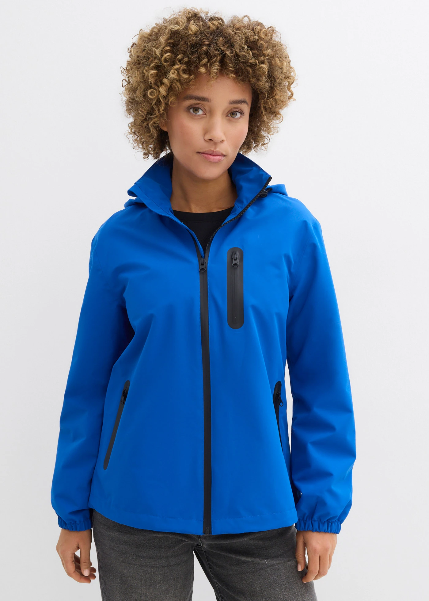 Veste imperméable ultra légère • bleu arctique/noir • Boutique bonprix
