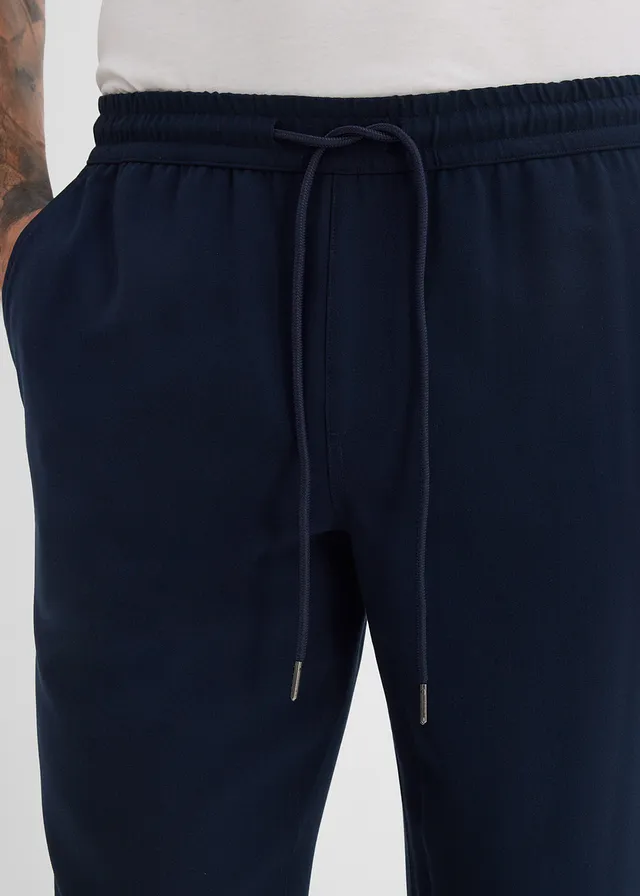 Chino extensible à taille élastiquée, droit et ample • bleu encre • product-page.page-title-suffix