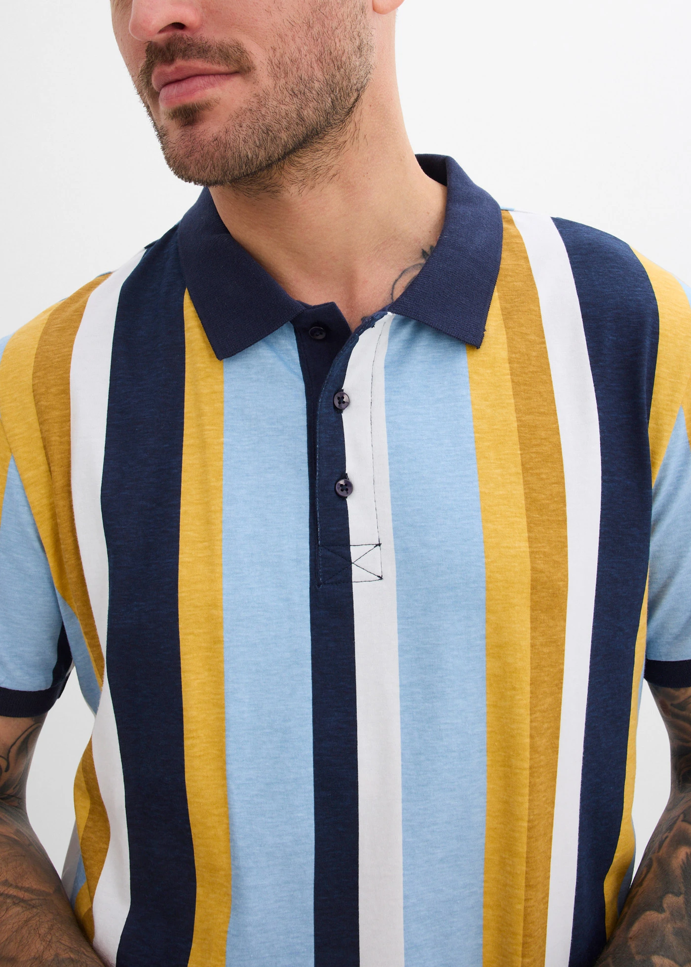 Poloshirt van biologisch katoen • donkerblauw-curry gestreept • bonprix online shop