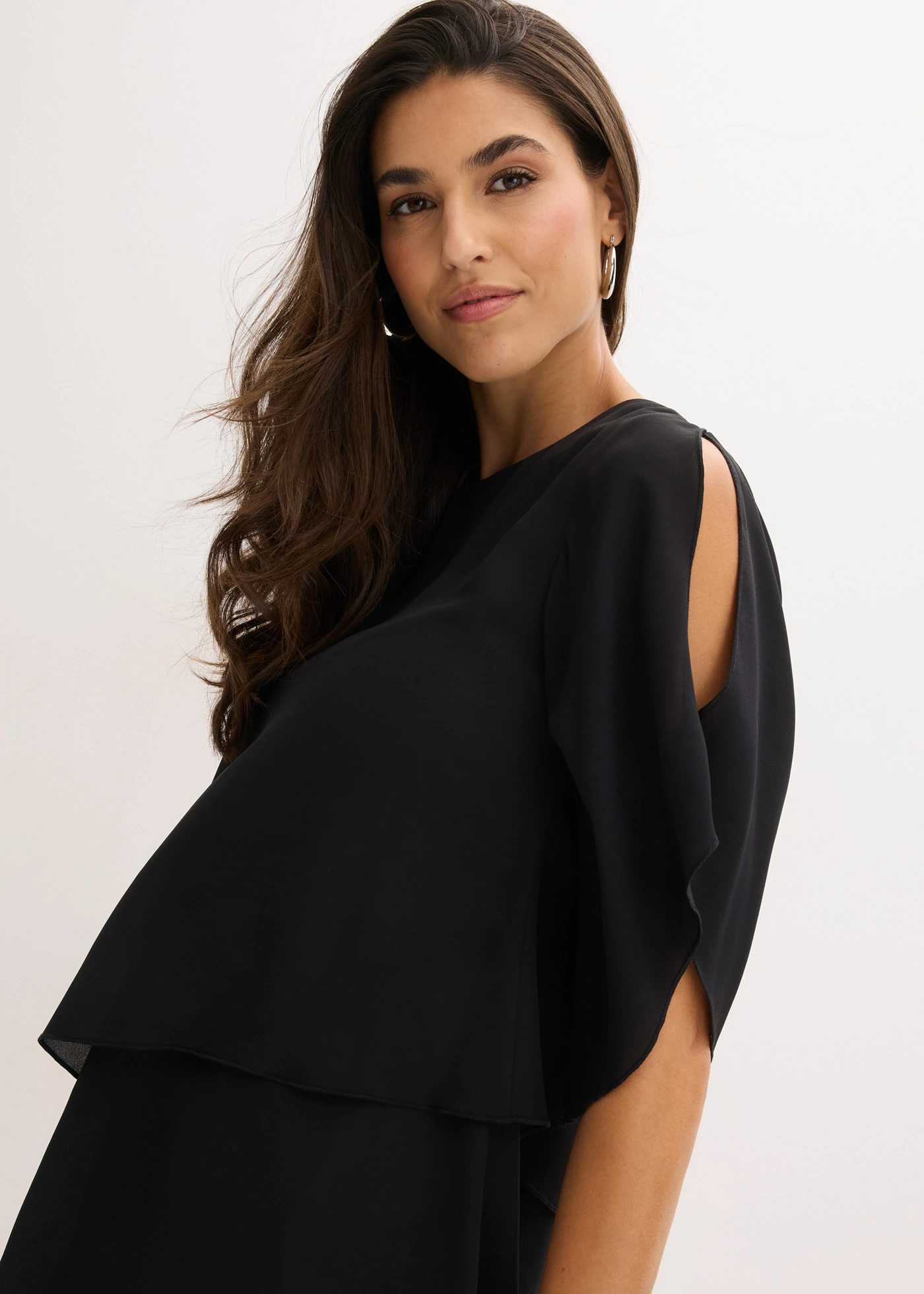 Blouse met puntjes in layerlook • zwart • bonprix online shop