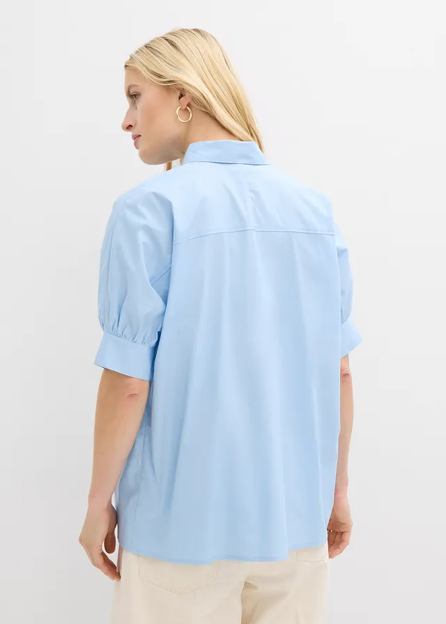 Oversized blouse • lichtblauw • product-page.page-title-suffix