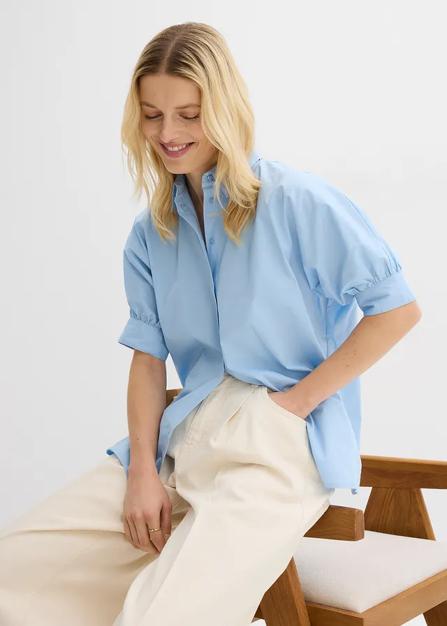 Oversized blouse • lichtblauw • product-page.page-title-suffix