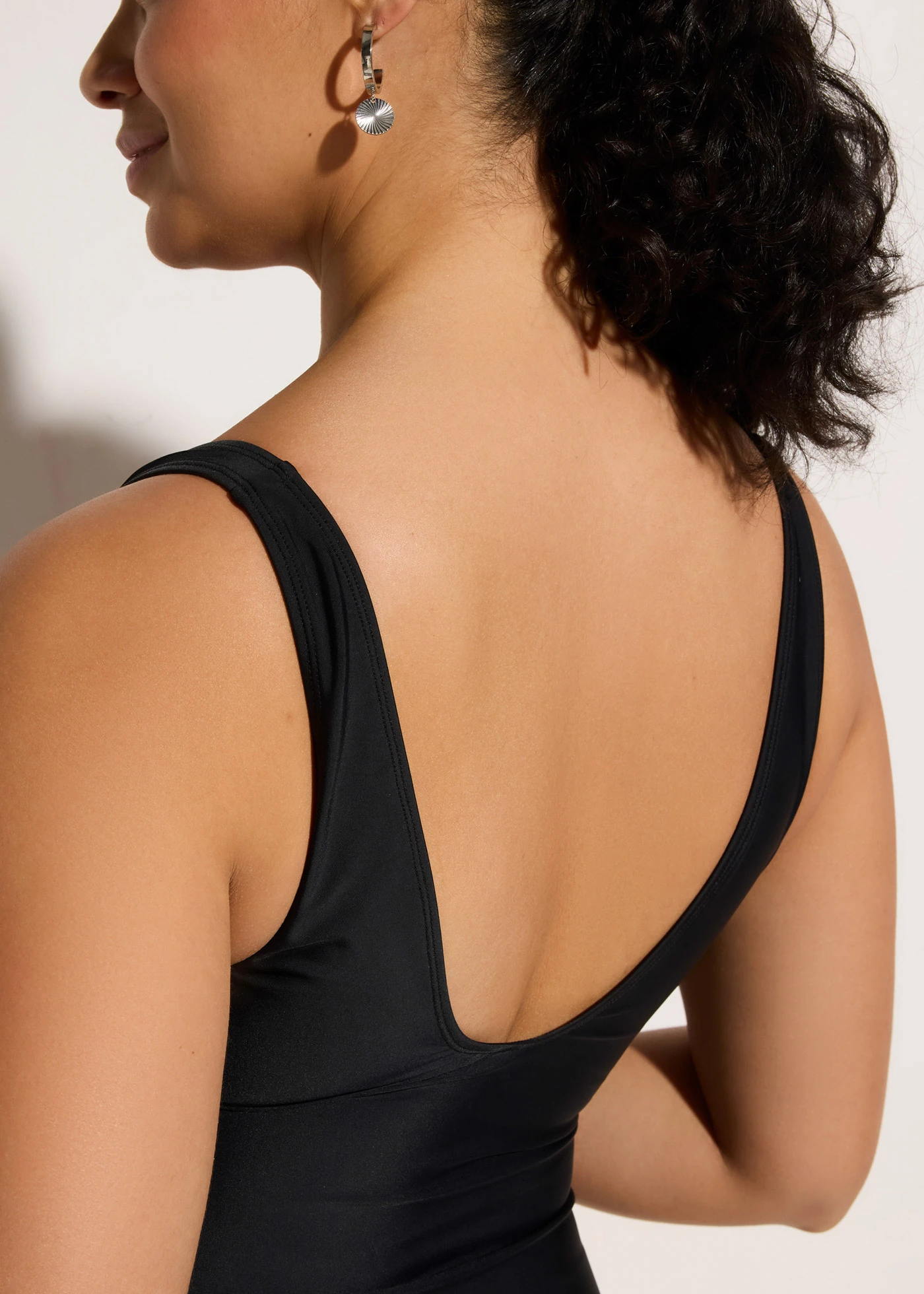 Medium corrigerend badpak met bedrukte inzetstukken • zwart grafische print • bonprix online shop