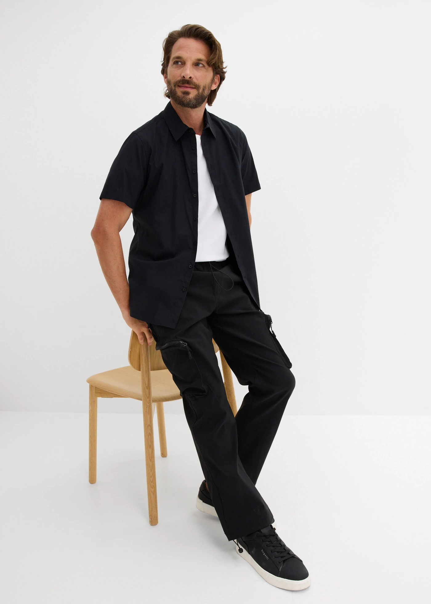 Pantalon droit très extensible à poches cargo zippées, regular • noir • Boutique bonprix