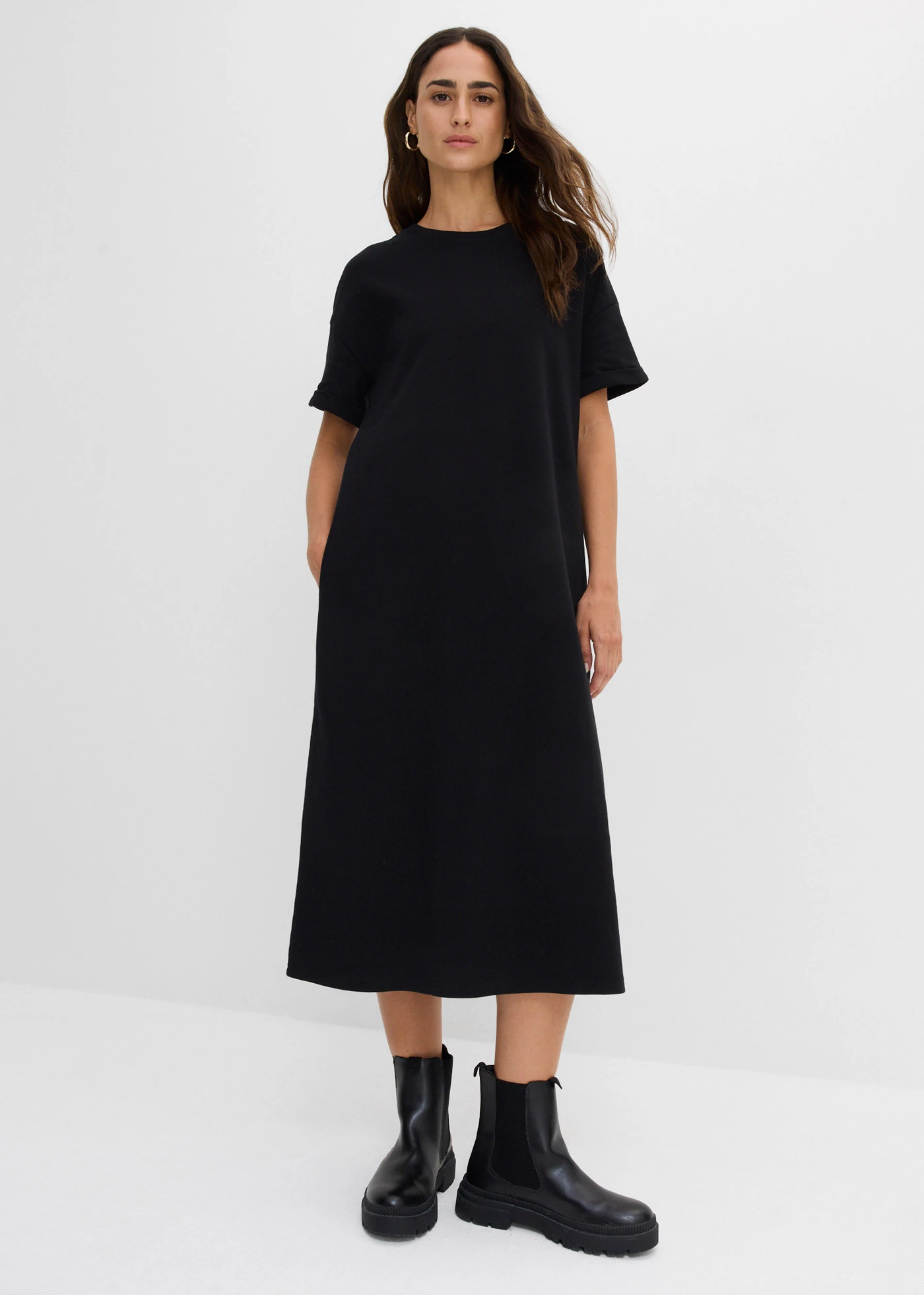 Robe large en jersey interlock épais avec poches • noir • Boutique bonprix