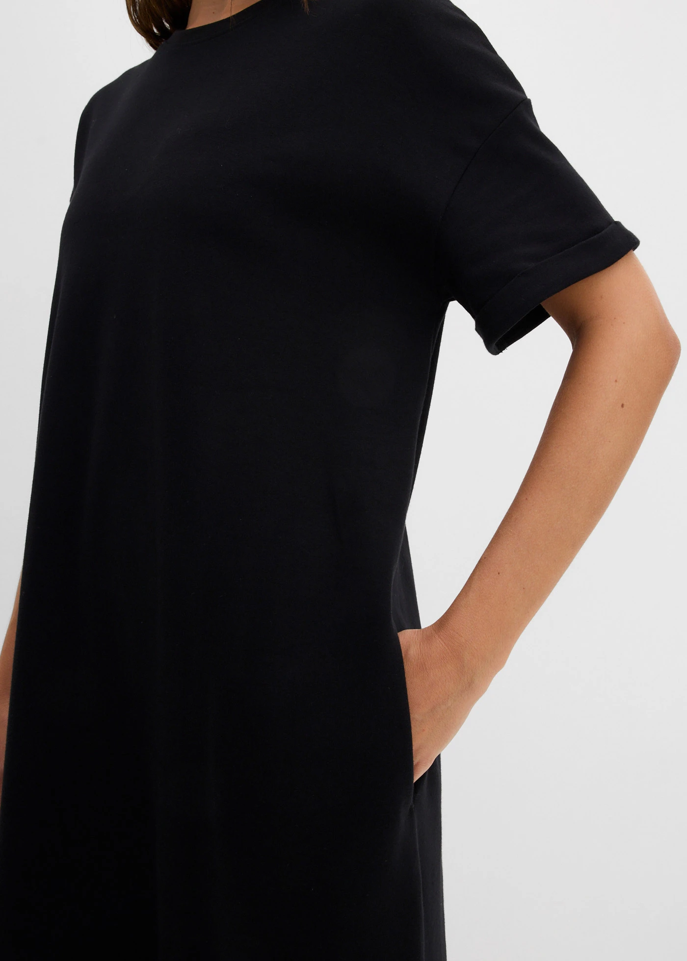 Rochie tricot din material interlock mai robust, cu buzunare • negru • magazin bonprix