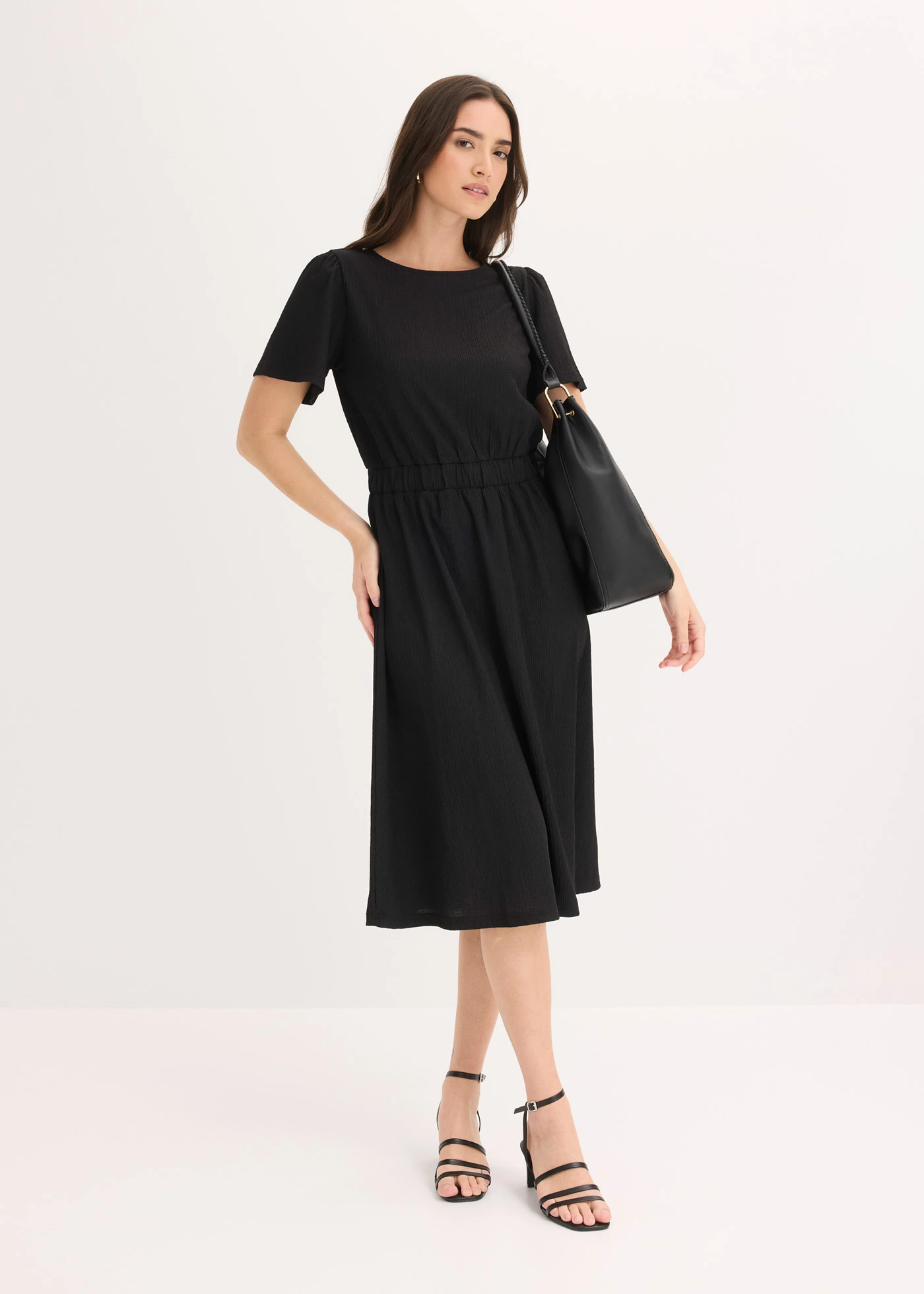 Uitlopende jersey jurk • zwart • bonprix online shop