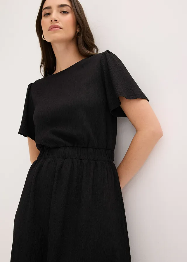 Uitlopende jersey jurk • zwart • product-page.page-title-suffix
