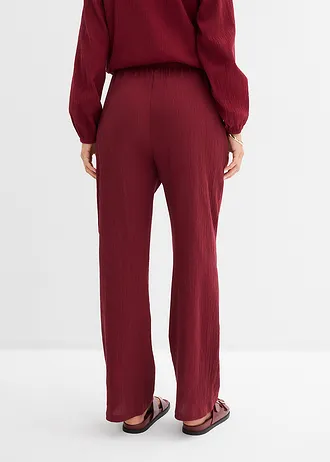 Pantaloni largi din material cu efect structurat • roșu rubiniu • magazin bonprix