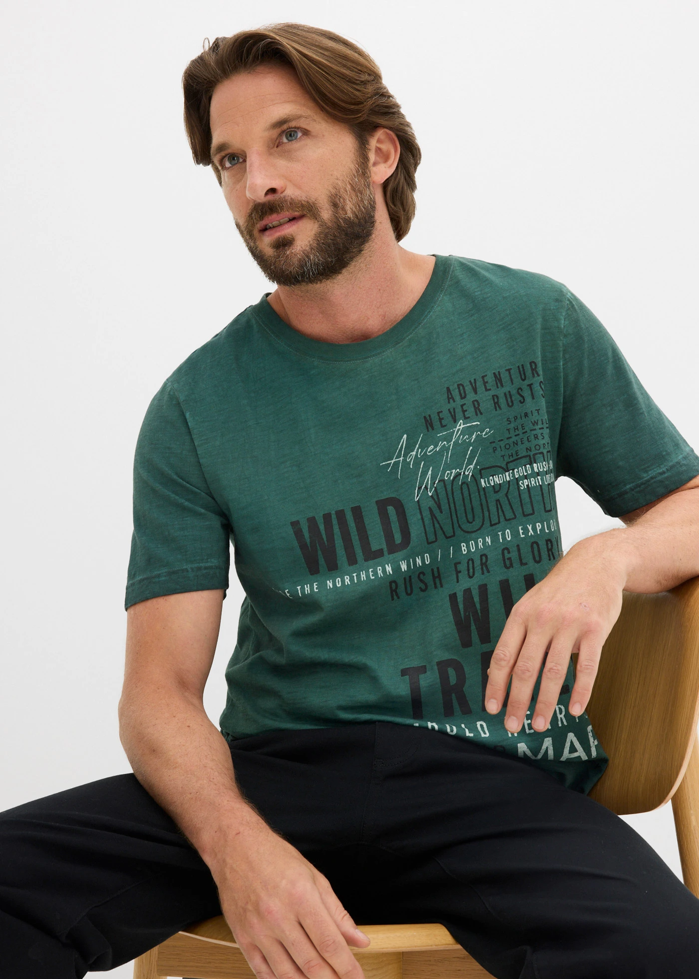 T-shirt z efektem sprania • ciemnozielony z nadrukiem • sklep bonprix