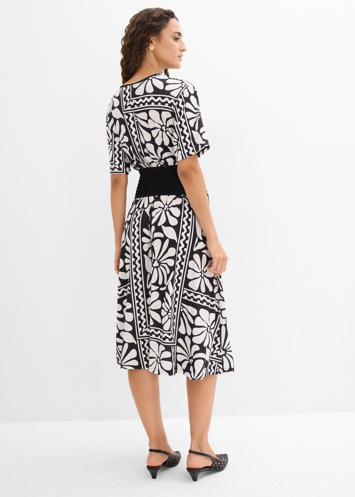Robe midi avec décolleté plongeant • noir-blanc nacré imprimé • Boutique bonprix
