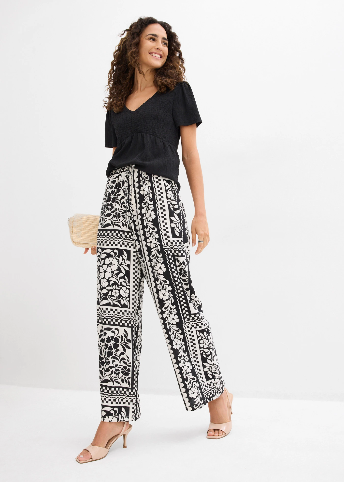 Broek van een soepele viscosemix • zwart-wolwit gedessineerd • bonprix online shop