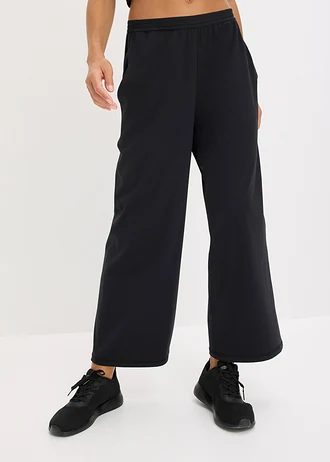 Pantaloni sport comozi cu croială largă pe picior și uscare rapidă • negru • magazin bonprix