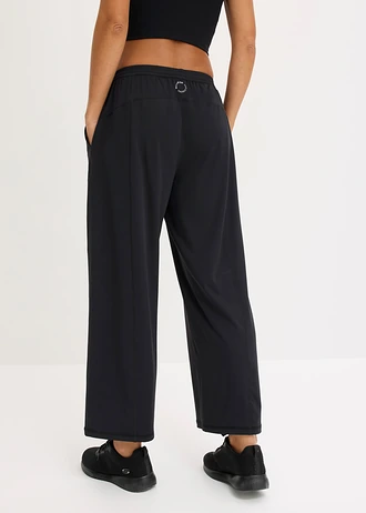 Pantaloni sport comozi cu croială largă pe picior și uscare rapidă • negru • magazin bonprix