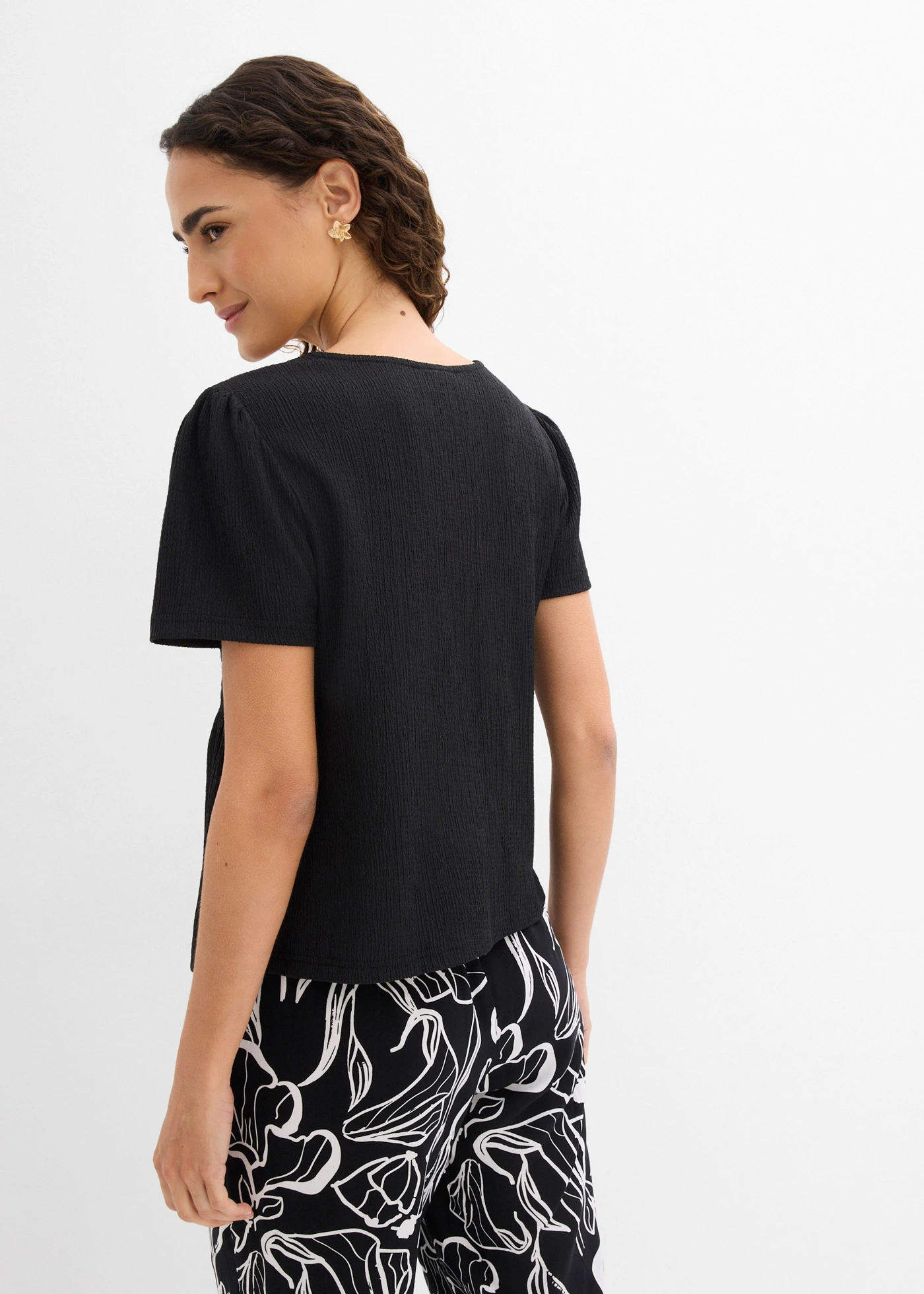 Bluză tricot din crep structurat • negru • magazin bonprix