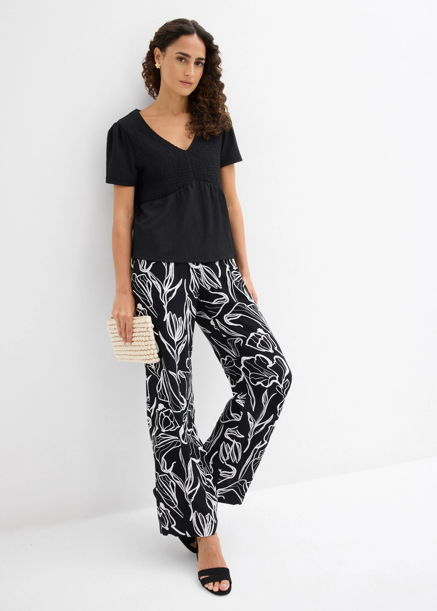 Bluză tricot din crep structurat • negru • magazin bonprix