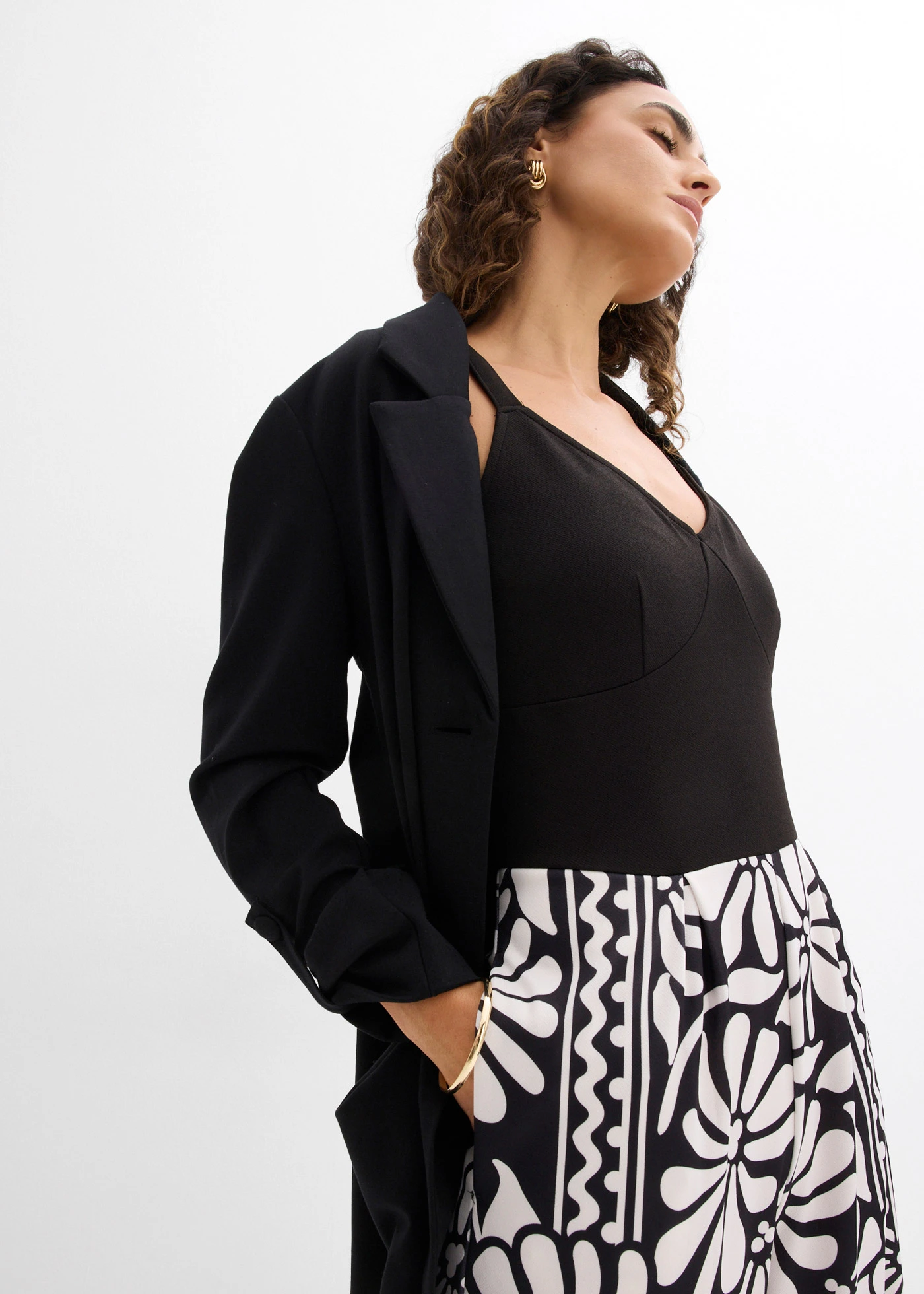 Salopetă din jerse • negru cu imprimeu • magazin bonprix