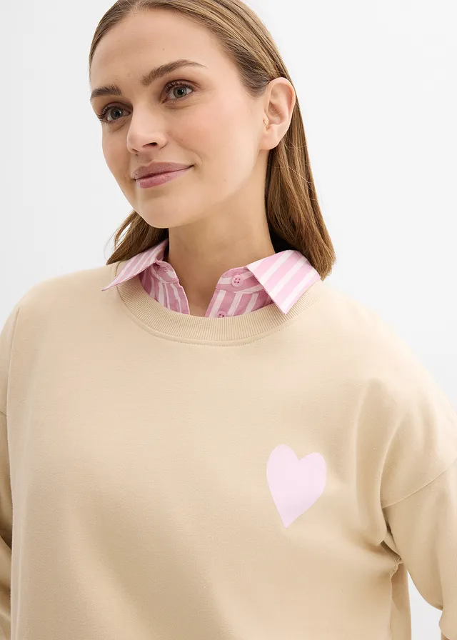 Oversized sweater van biologisch katoen • lichtsand/kristalroze met print • product-page.page-title-suffix