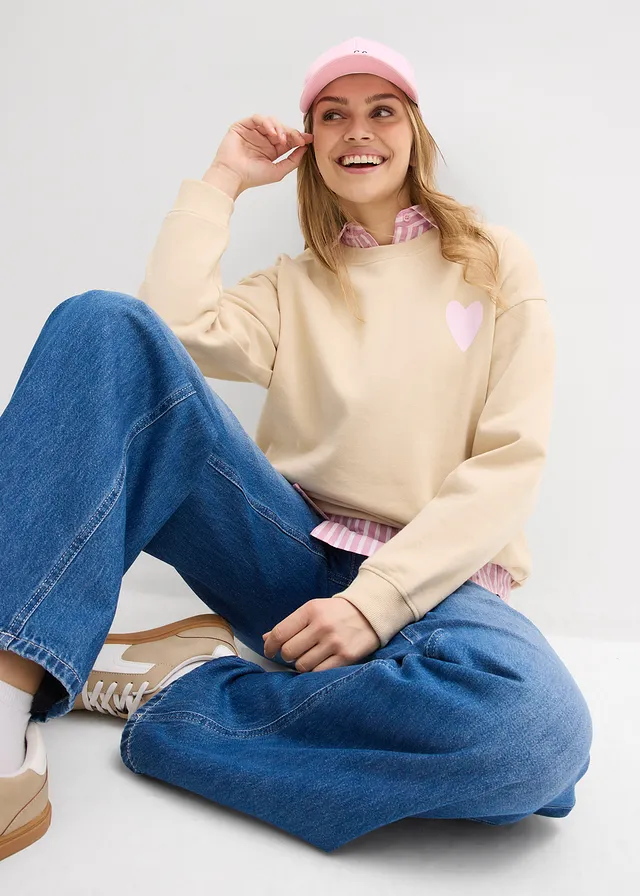 Oversized sweater van biologisch katoen • lichtsand/kristalroze met print • product-page.page-title-suffix